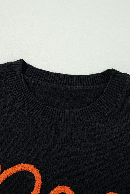 Schwarzer boo strickpullover mit geripptem rand und schultern
