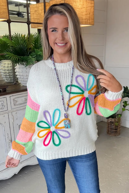 Weißer blumengrafik-colorblock-pullover mit rundhalsausschnitt