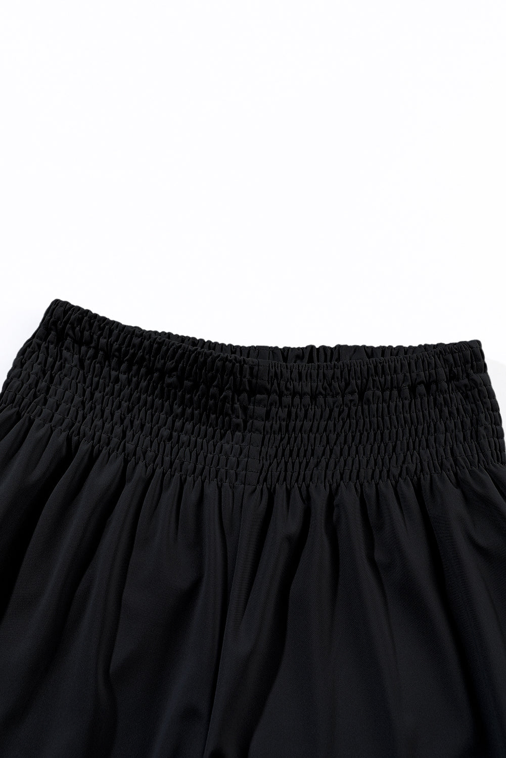 Schwarze gesmokte jogginghose mit hoher taille