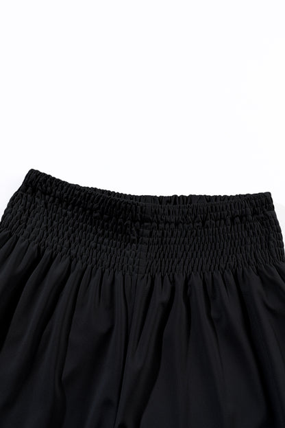 Schwarze gesmokte jogginghose mit hoher taille