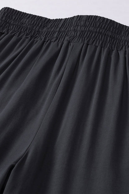 Schwarzer kordelzug elastische taille lässige hose mit weitem bein