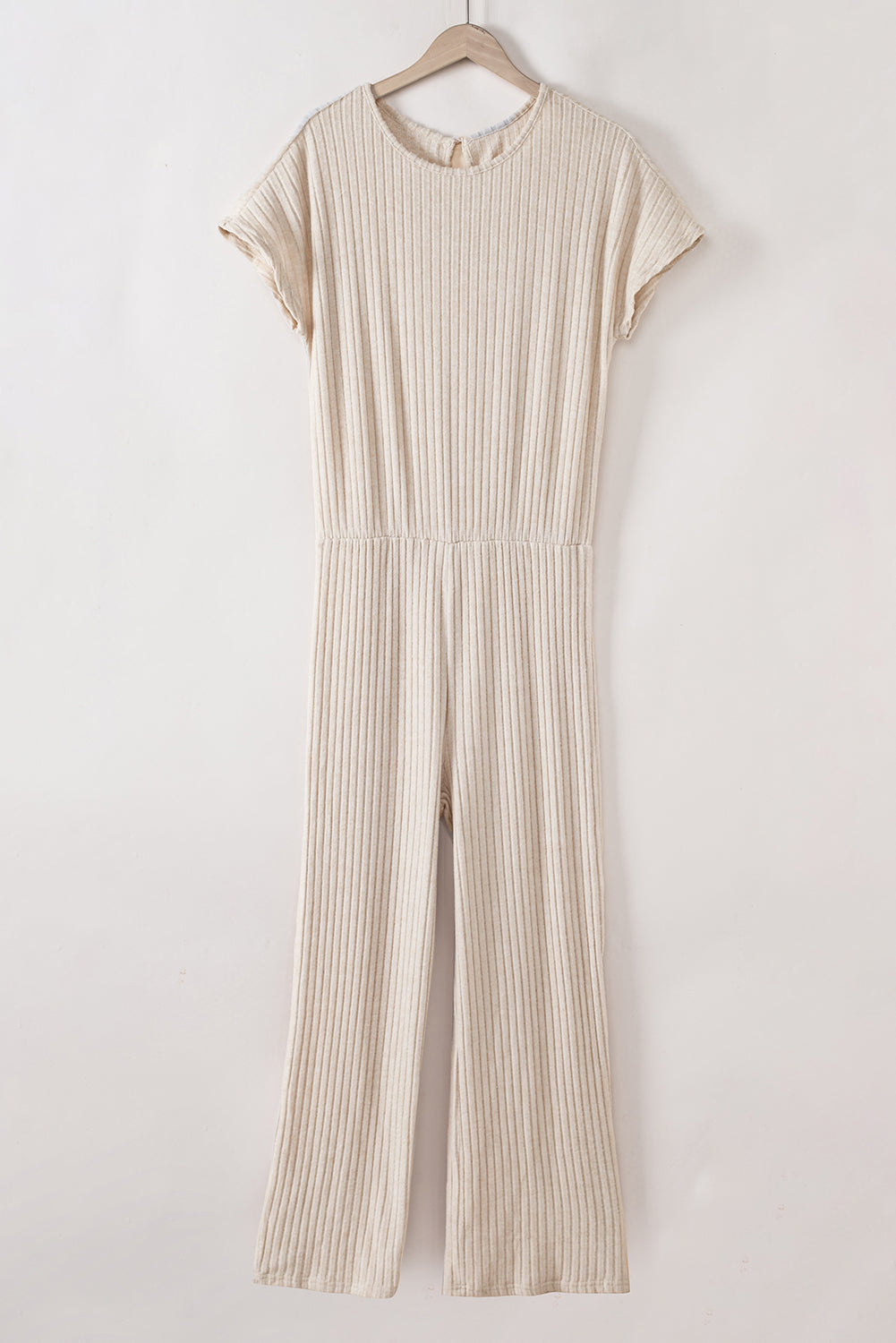 Pergamentfarbener gerippter kurzarm-overall mit weitem bein
