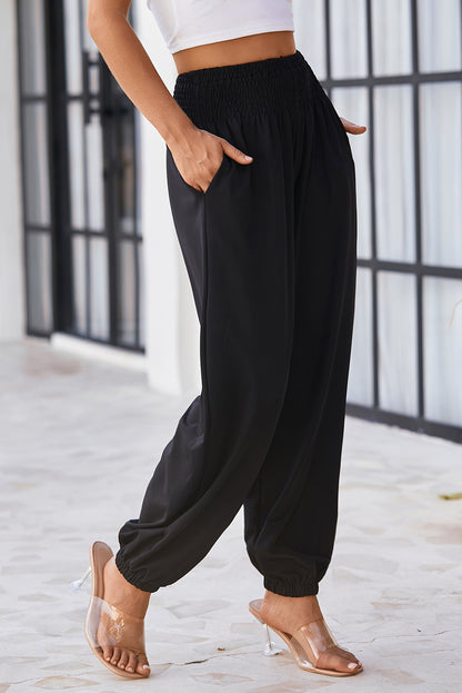 Schwarze gesmokte jogginghose mit hoher taille