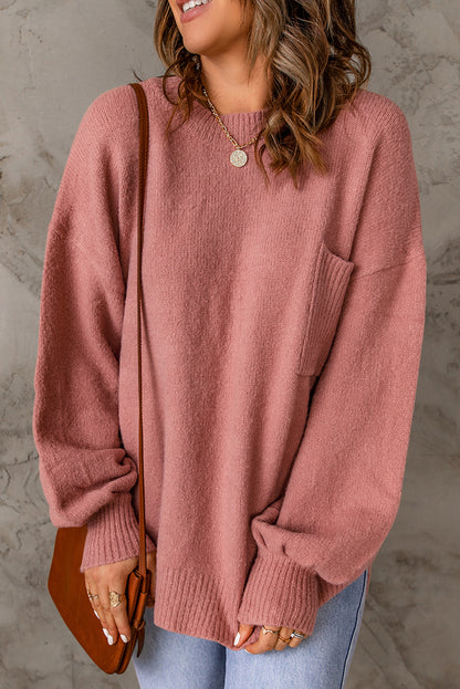 Unifarbener pullover mit puffärmeln und taschen
