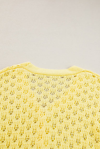 Gelber pointelle-strickpullover mit v-ausschnitt strickjacke