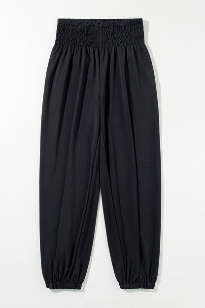 Schwarze gesmokte jogginghose mit hoher taille