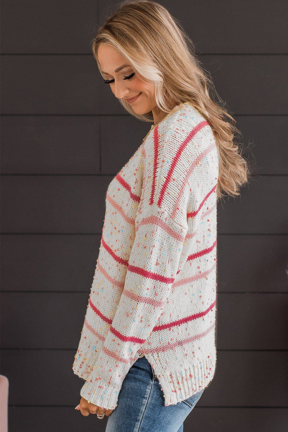 Rosa gestreifter konfetti-strickpullover