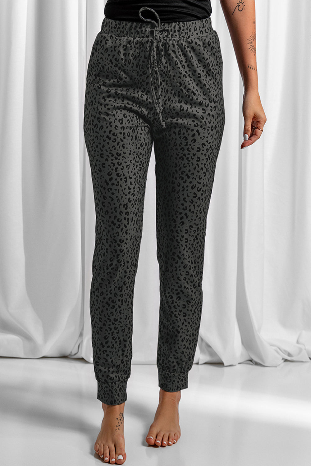 Schwarze breezy-leopard-jogginghose