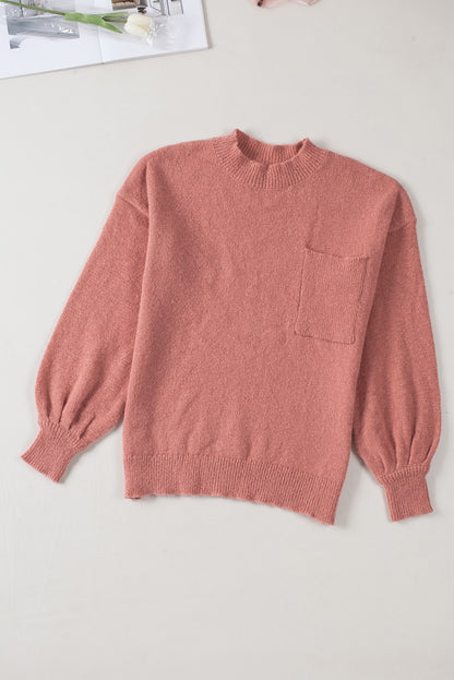 Unifarbener pullover mit puffärmeln und taschen