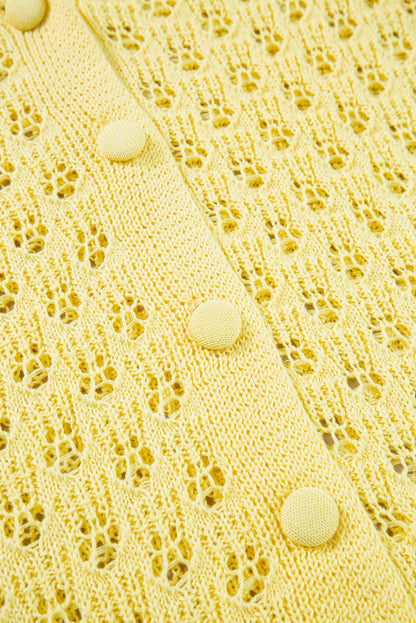 Gelber pointelle-strickpullover mit v-ausschnitt strickjacke