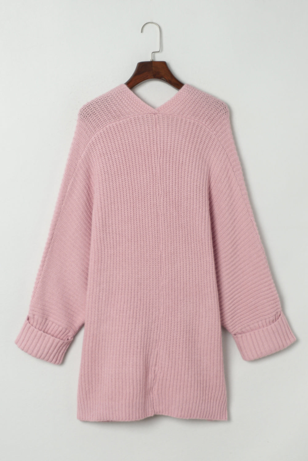 Rosa übergroßer pullover mit umgeschlagenen ärmeln cardigan