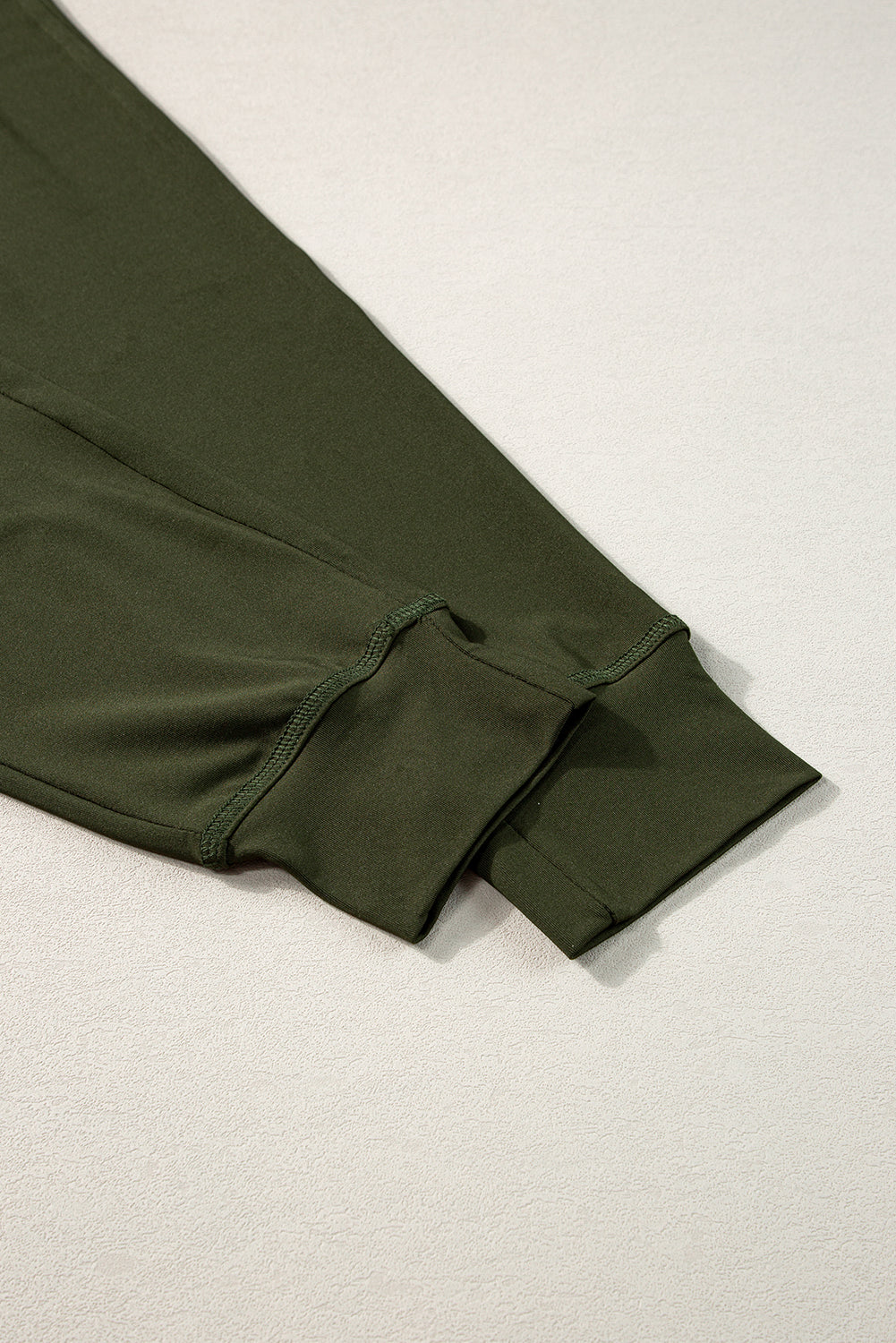 Moosgrüne jogginghose mit kordelzug an der taille
