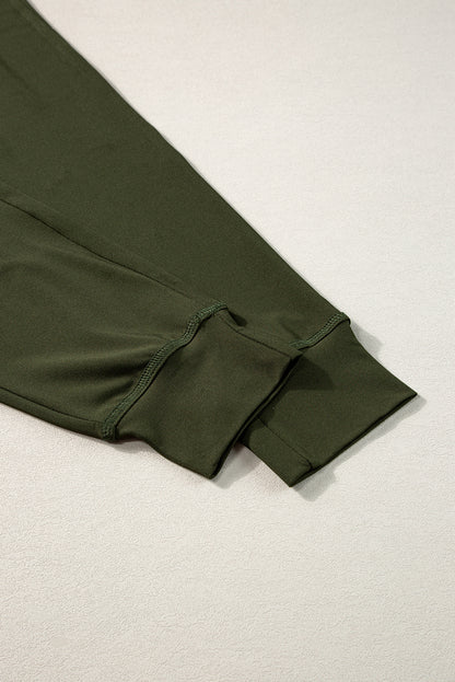 Moosgrüne jogginghose mit kordelzug an der taille