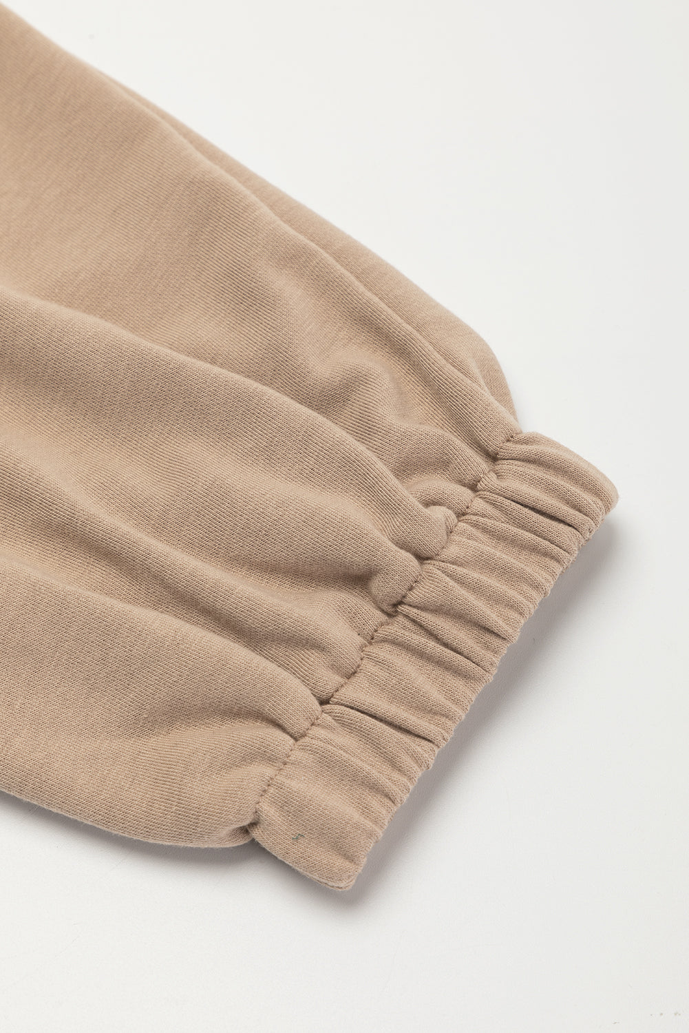 Light french beige cap sleeve open back drawstring jogger jumpsuit