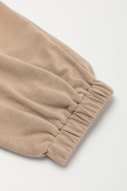 Light french beige cap sleeve open back drawstring jogger jumpsuit
