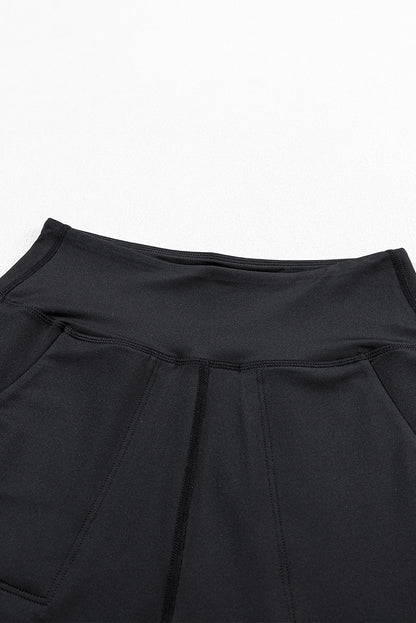 Schwarze jogginghose mit hoher taille und offener naht
