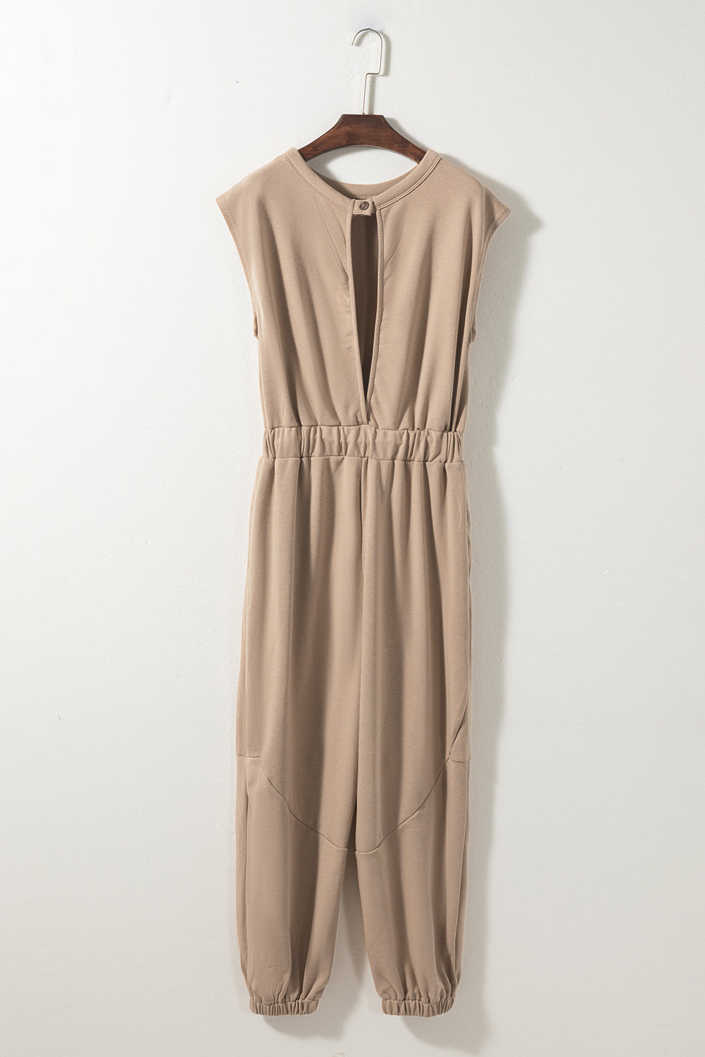 Light french beige cap sleeve open back drawstring jogger jumpsuit