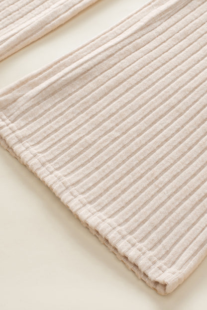 Pergamentfarbener gerippter kurzarm-overall mit weitem bein