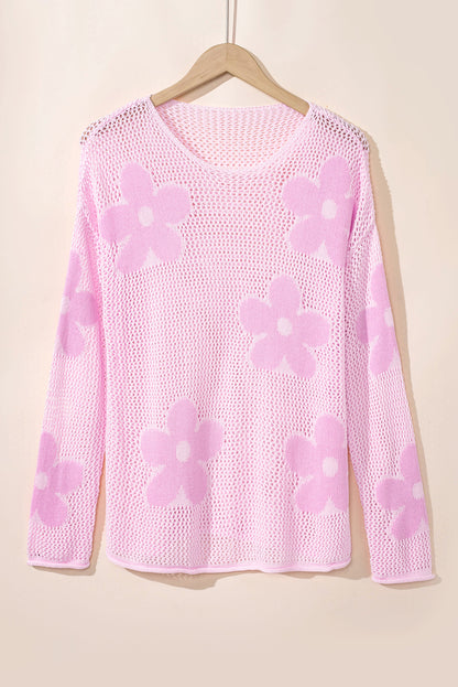 Rosafarbener pullover mit großer blume und hohlen schultern aus strick