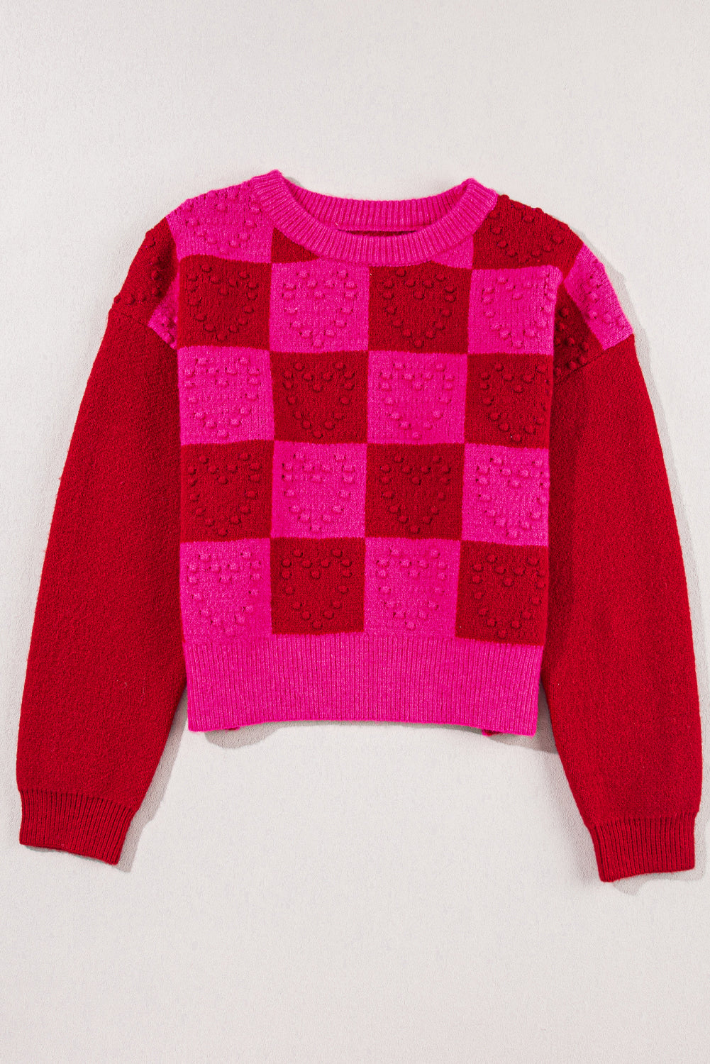 Mehrfarbig kariertes muster herz-detail strukturierter pullover
