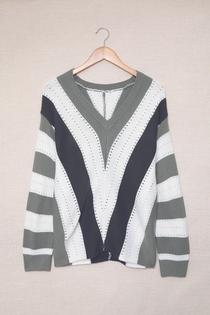 Grauer gestreifter colorblock v-ausschnitt strickpullover