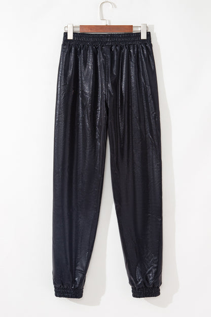 Schwarze kiesel-jogger mit elastischer taille