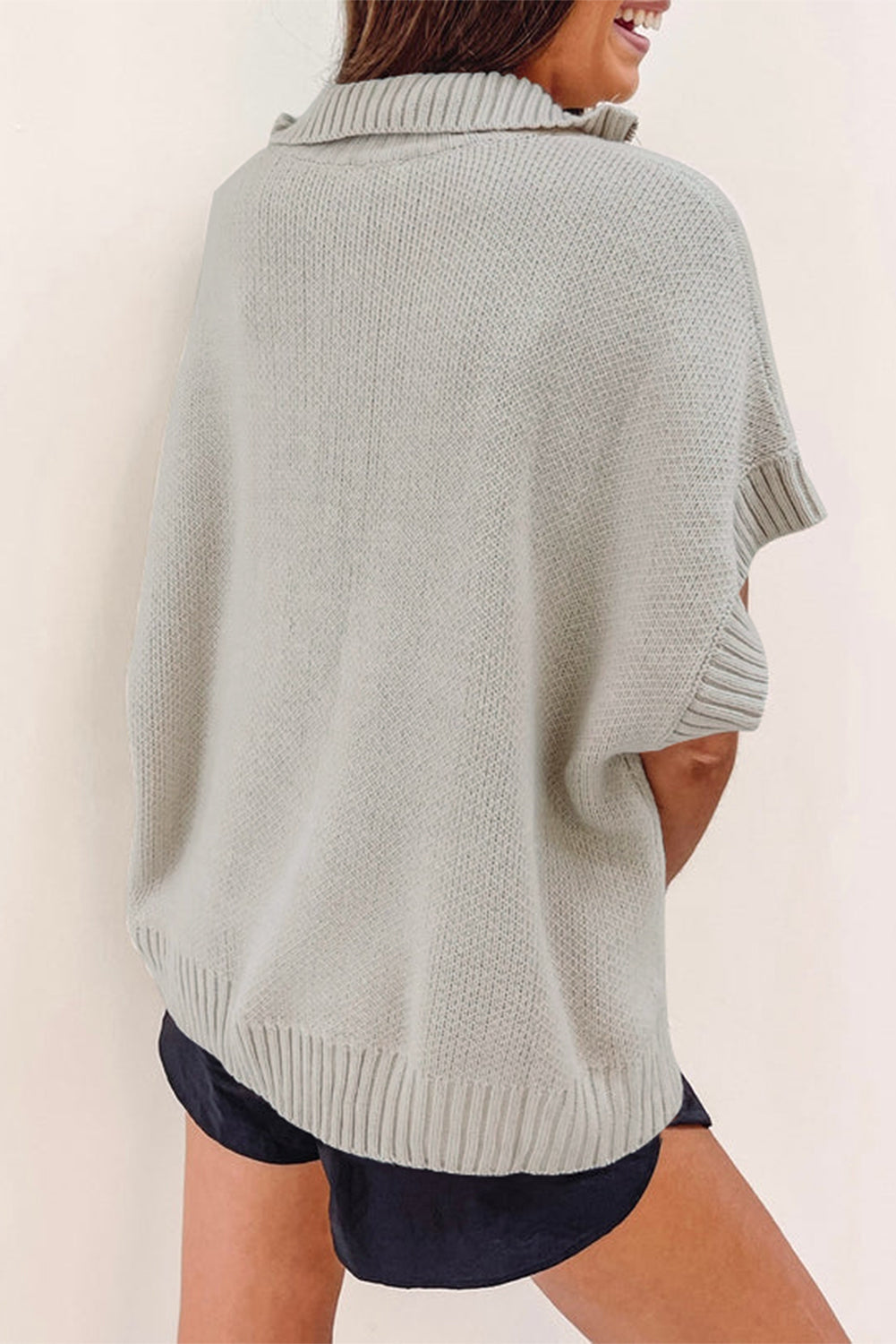 Hellgrauer quarter zip pullover mit kurzen fledermausärmeln