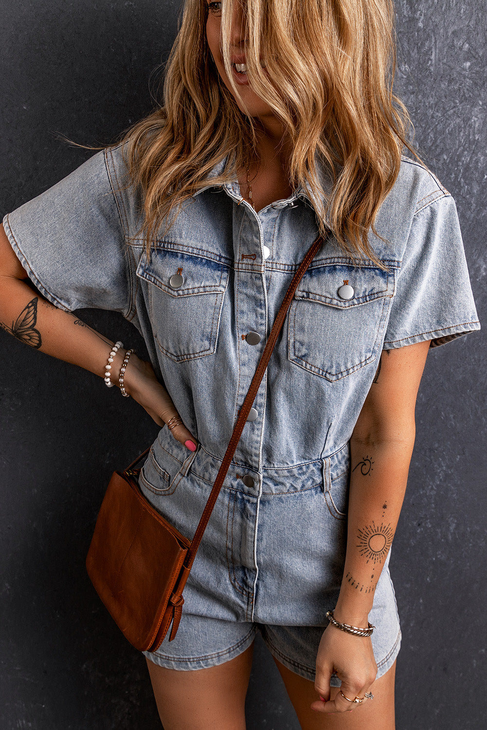 Hellblauer vintage washed buttons pocketed denim romper