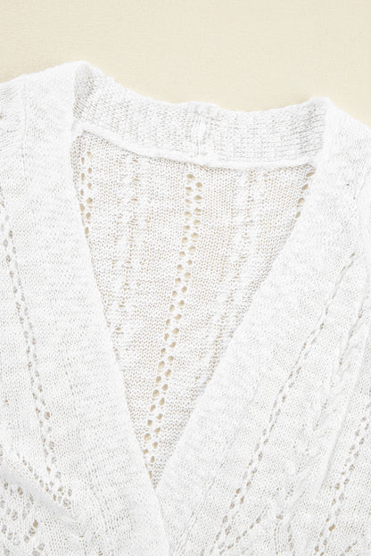 Weiße solide strickjacke mit offenem schnitt