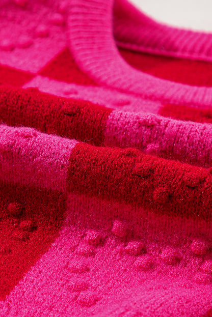 Mehrfarbig kariertes muster herz-detail strukturierter pullover