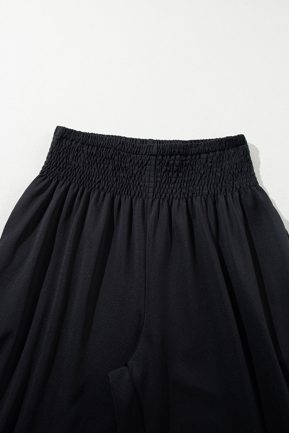 Schwarze gesmokte jogginghose mit hoher taille