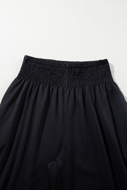 Schwarze gesmokte jogginghose mit hoher taille