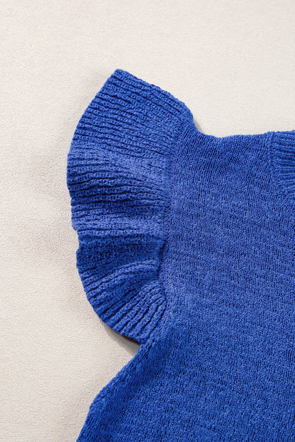 Dunkelblaues strickpullover-top mit rüschenärmeln