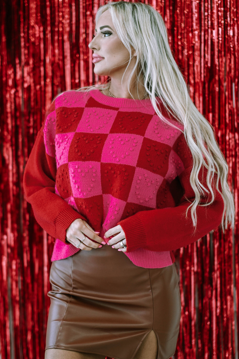 Mehrfarbig kariertes muster herz-detail strukturierter pullover