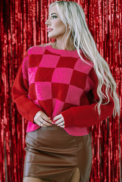 Mehrfarbig kariertes muster herz-detail strukturierter pullover