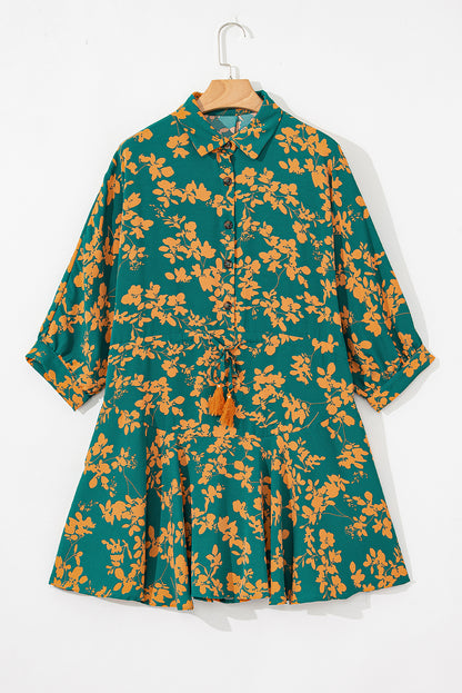 Grüner blumendruck kordelzug tunika kurzes kleid