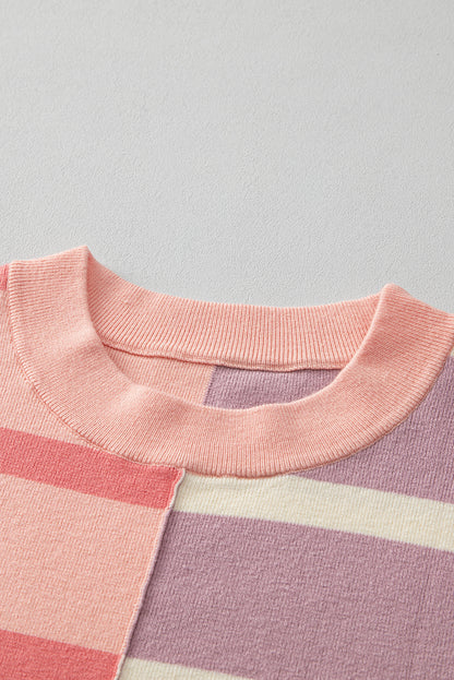 Rosa gestreifter colorblock-pullover in übergröße