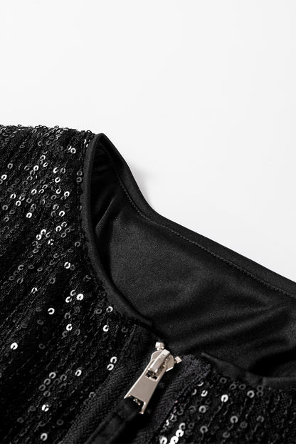 Schwarze paillettenjacke mit rundhalsausschnitt und langen ärmeln