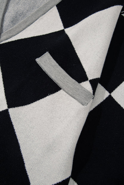 Schwarzer colorblock-cardigan mit geknöpften schultern und lockerer passform