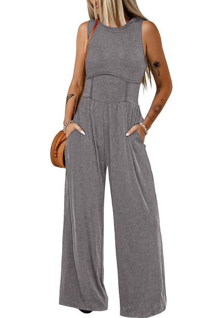 Mittelgrauer ärmelloser jumpsuit mit weitem bein und eingeschnürter taille