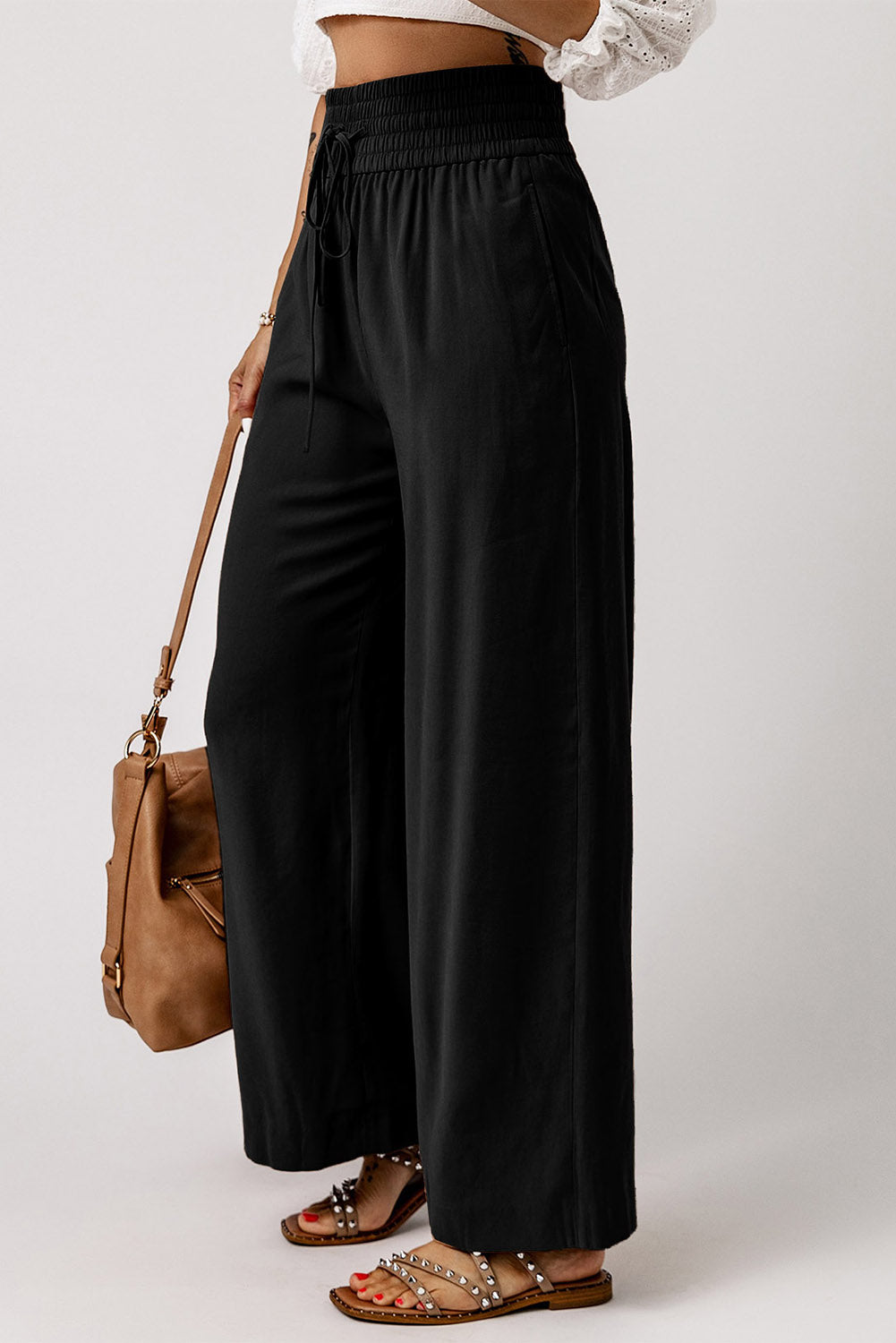 Schwarzer kordelzug elastische taille lässige hose mit weitem bein