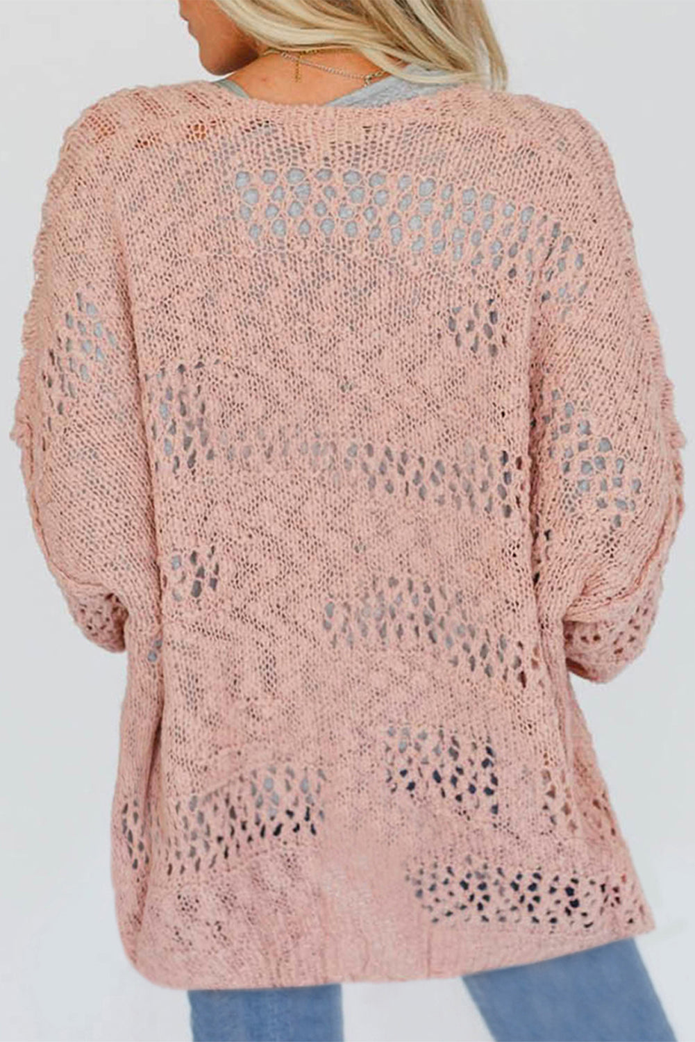 Rosa lässige strickjacke mit dolman-ärmeln und lochmuster