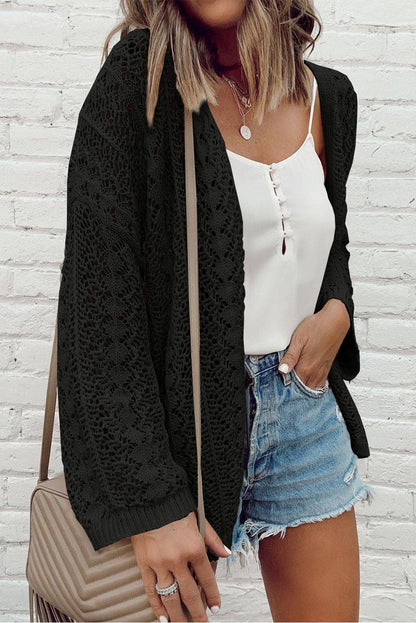 Schwarzer hollow out strickcardigan mit offener schulterpartie