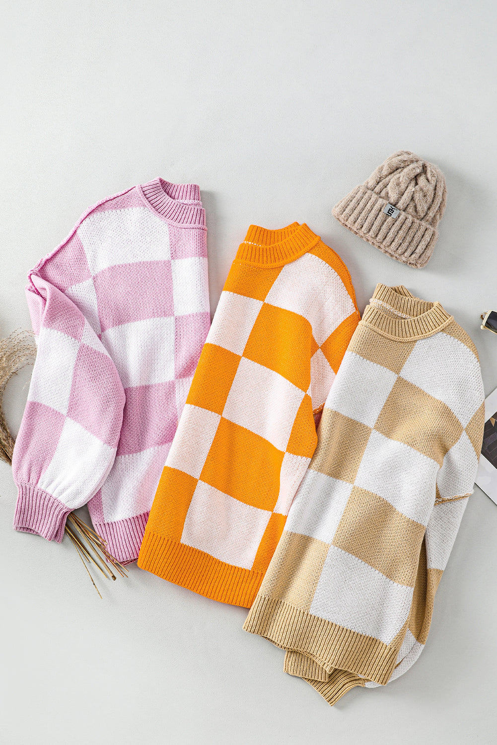 Orange karierter pullover mit läuferärmeln