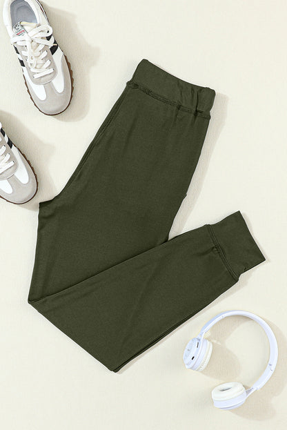 Moosgrüne jogginghose mit kordelzug an der taille