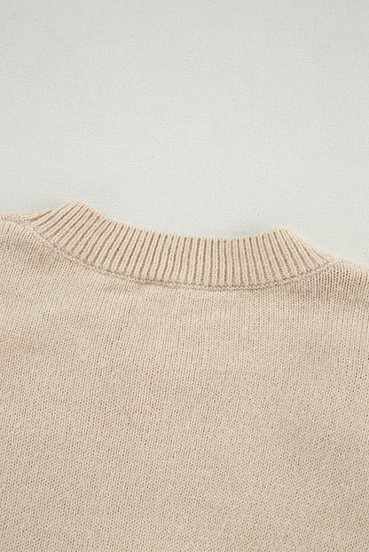 Pergamentfarbener, gehäkelter grobstrick-pullover