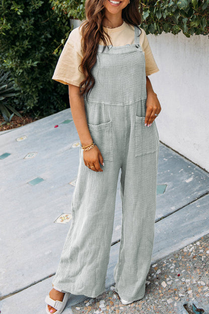 Grauer strukturierter overall mit weitem bein und taschen