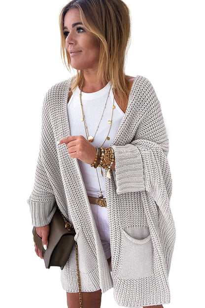 Grauer übergroßer pullover mit umgeschlagenen ärmeln cardigan