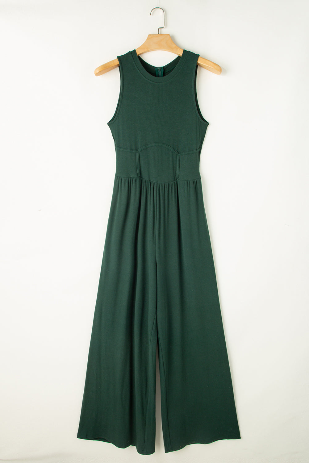 Schwarzgrüner ärmelloser jumpsuit mit weitem bein und geschnürter taille