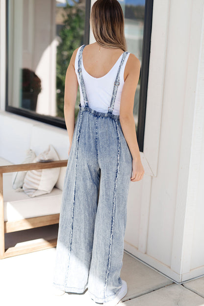 Beau blue light wash ausgefranste exponierte naht weites bein denim overall